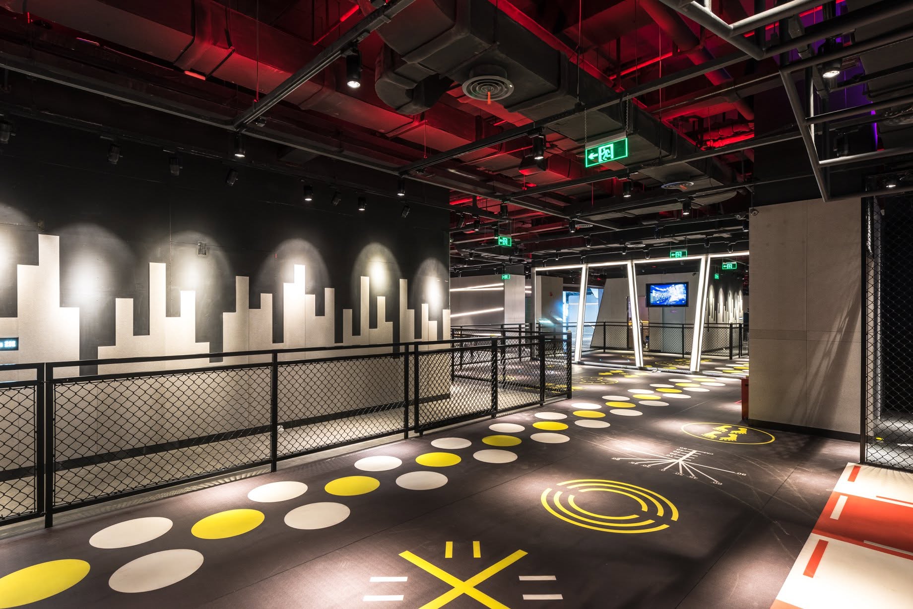 A Will's functional training floor marked out with yellow and white court graphics